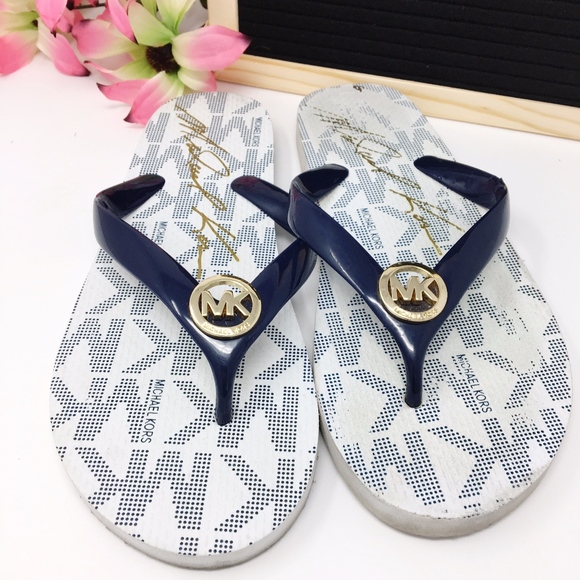 white and gold flip flops